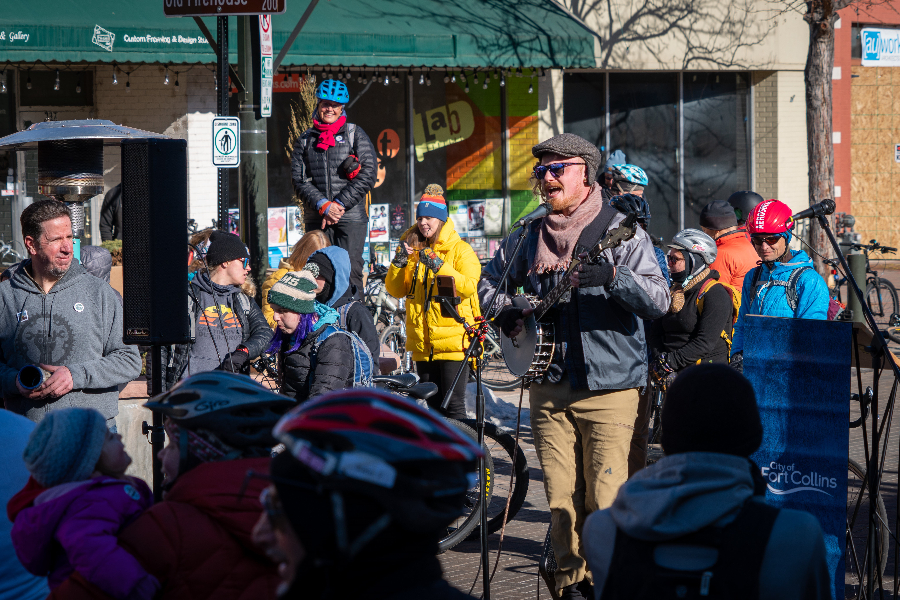 Crispy Watkins playing banjo at Bike to Work Day Closing Ceremonies 2024