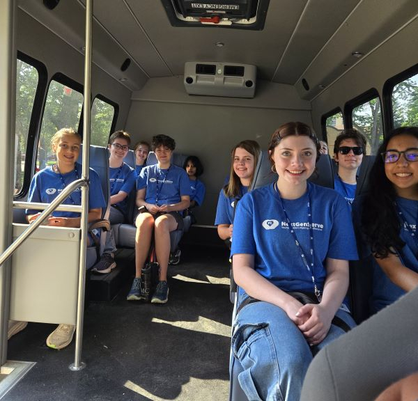 Teens on the bus to The Gardens on Spring Creek.